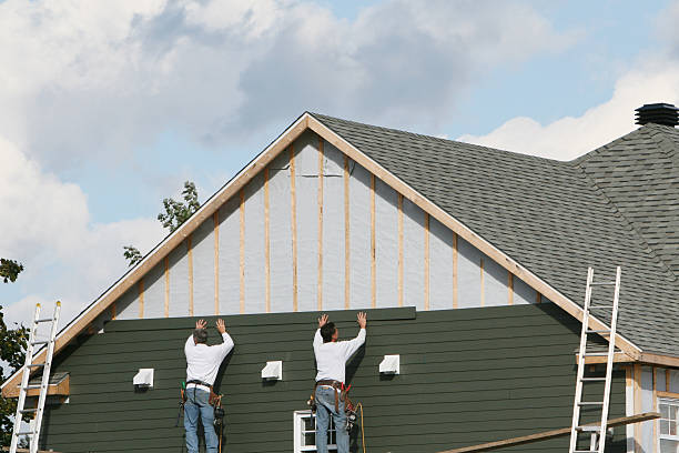 Professional Siding Installation technician working in Concord, NC